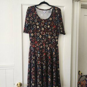 Lula Roe Amelia Dress with a whimsical print